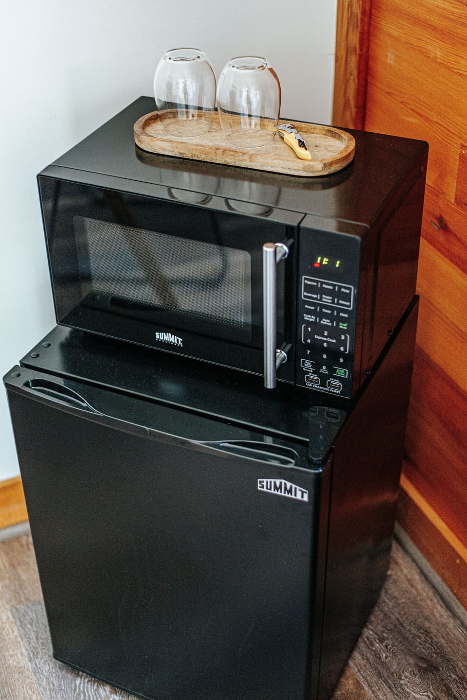 Well-equipped kitchenette with microwave and mini-fridge for convenience.