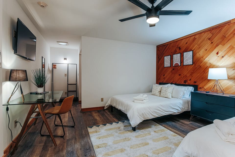 Spacious interiors blend workspace with cozy accommodations for work or leisure. 