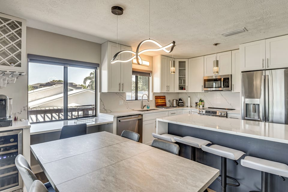 Dining Area | Dishware & Flatware | Central A/C & Heat | 2nd Floor