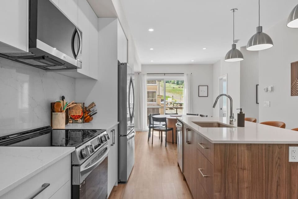 Full kitchen with a drip coffee maker, ground coffee, tea,  sugar and basic condiments (ketchup, mustard, relish.)
