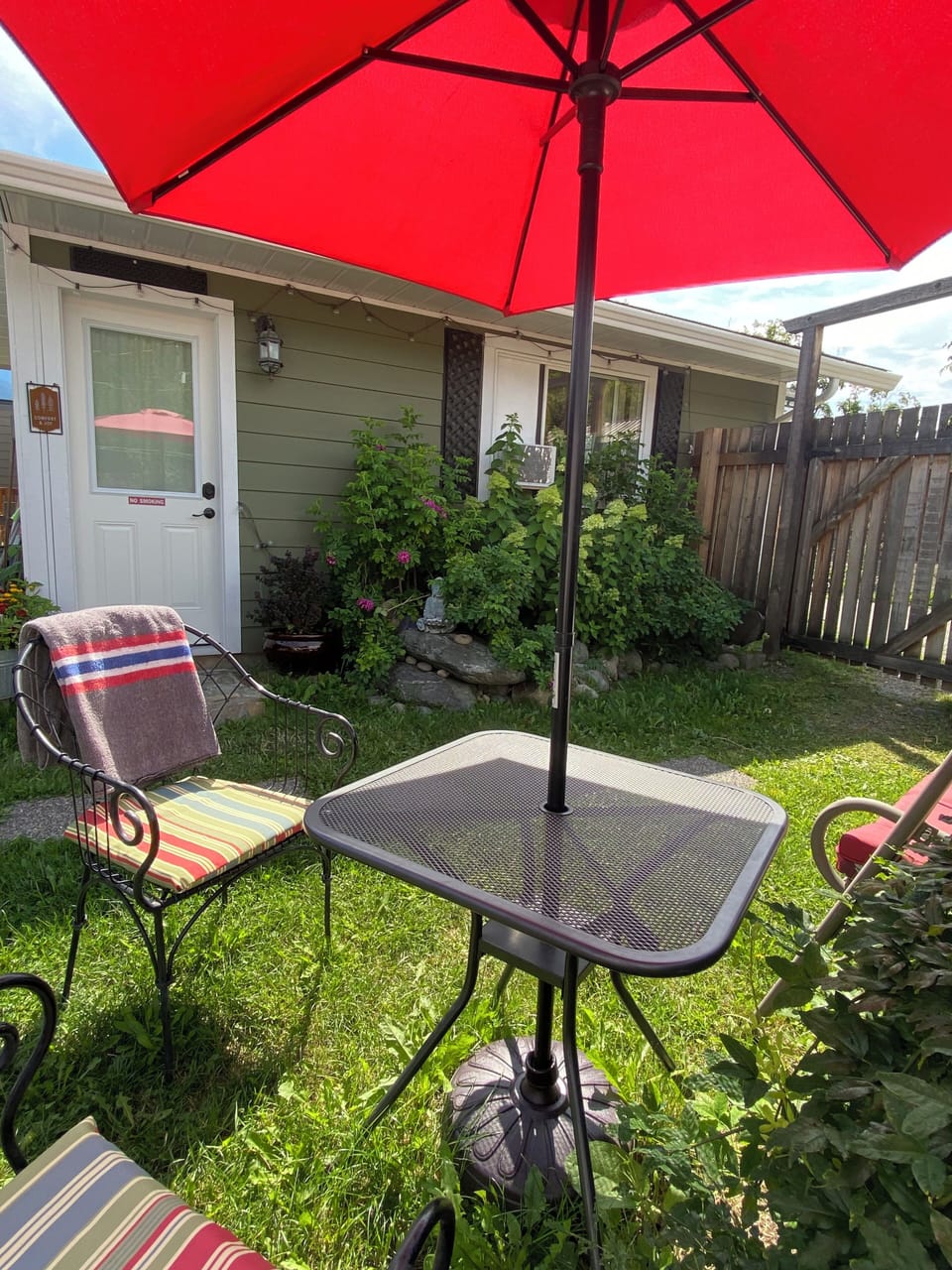 Backyard. Table and chairs.