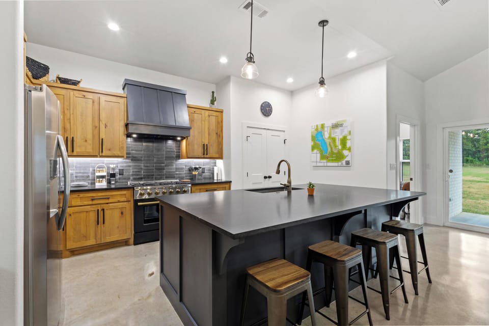 Unleash your inner chef in our fully stocked kitchen with an oversized island.
