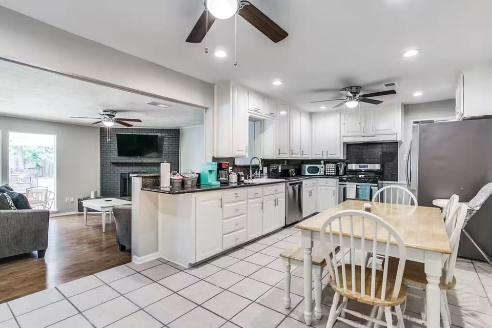 Dining area open to kitchen and living room.