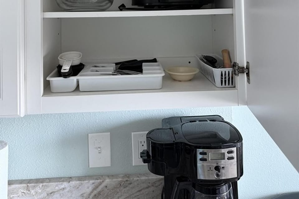 Fully stocked cabinets with essential kitchen utensils for your stay.