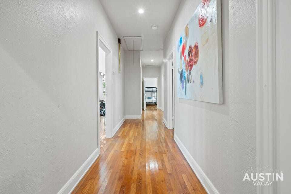 This hallway leads to restful retreats and lively gatherings.