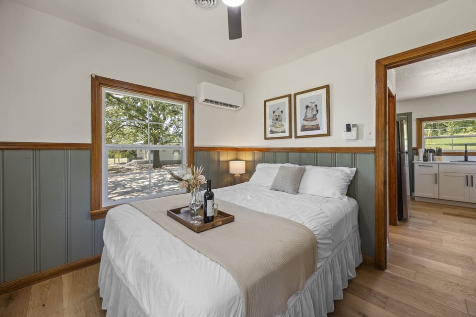 Cozy bedroom with soft bedding and natural light