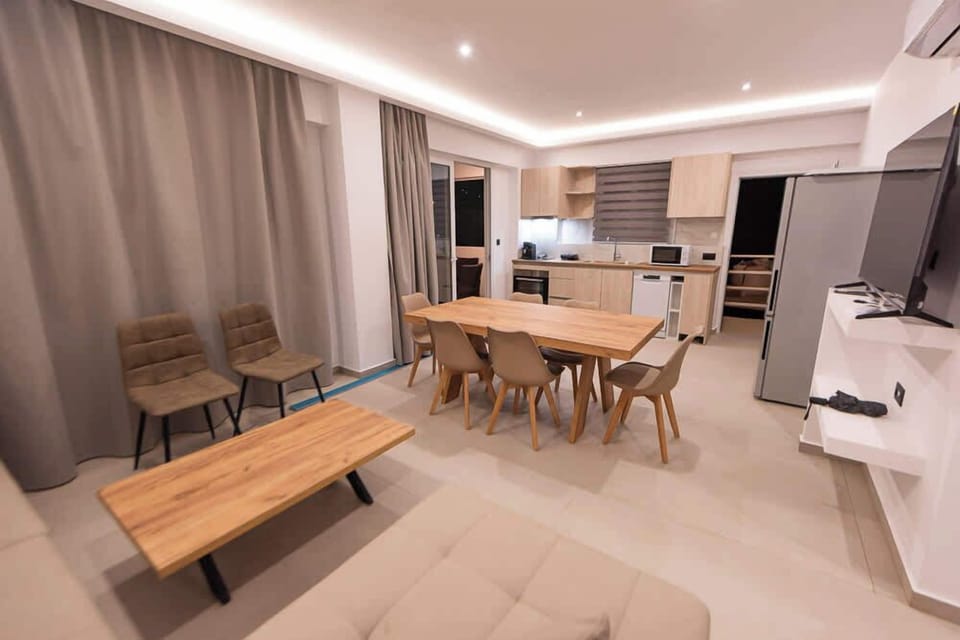 Open Living-Dining Area with Warm Ambient Lighting

