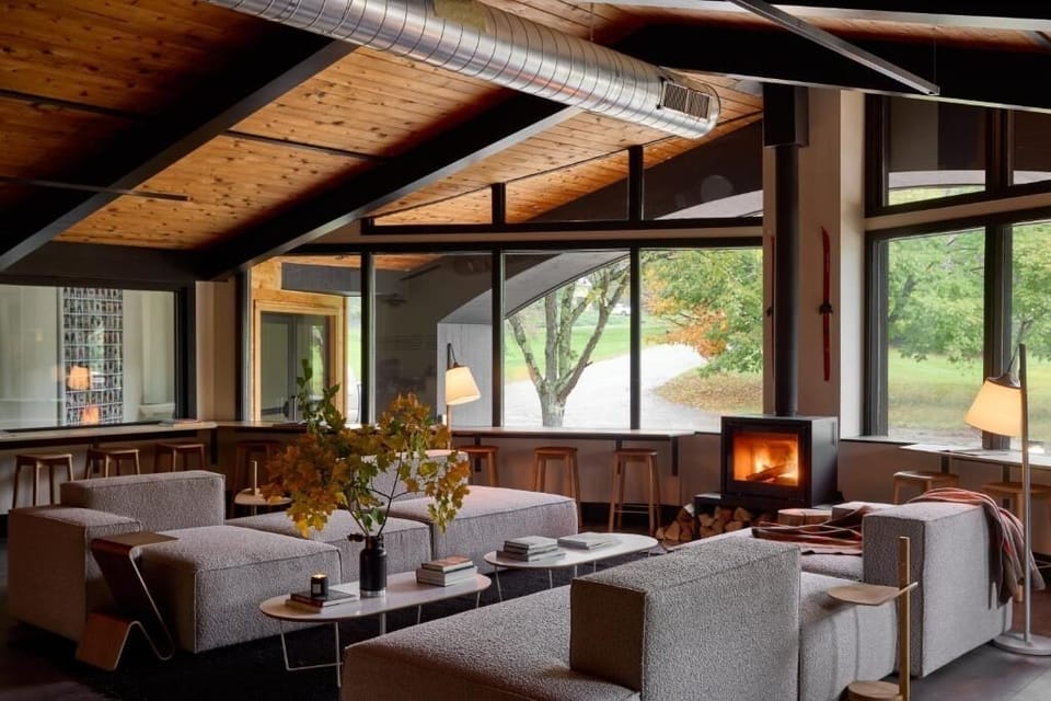 Unwind by the crackling fireplace in a designer great room.