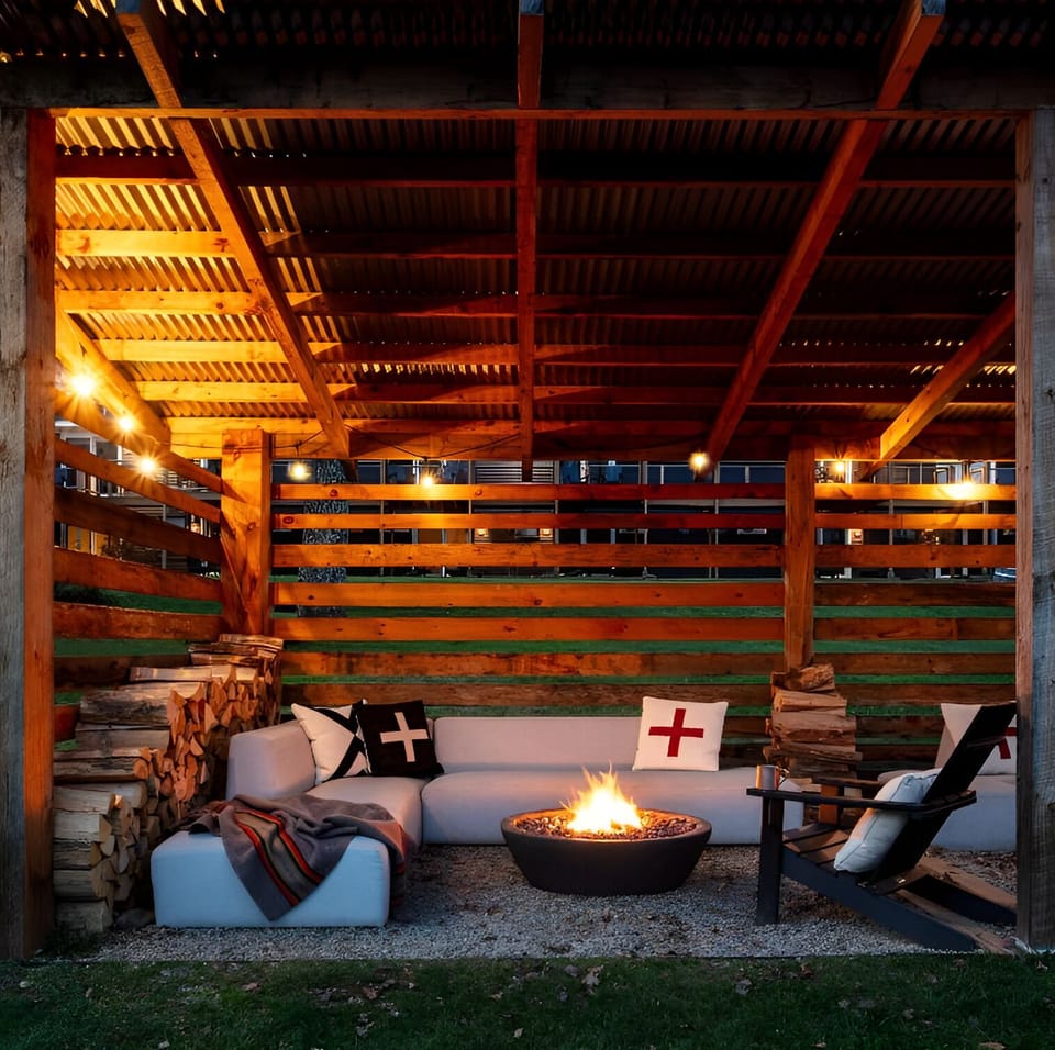 Linger by the fire on a sheltered patio lounge.