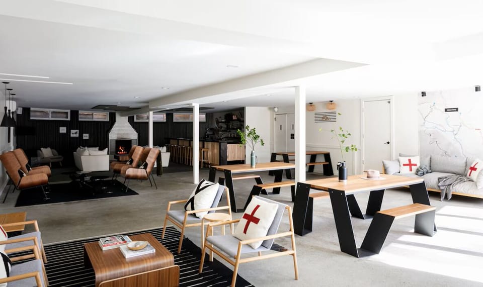 Gather for meals and games in this airy communal lounge.