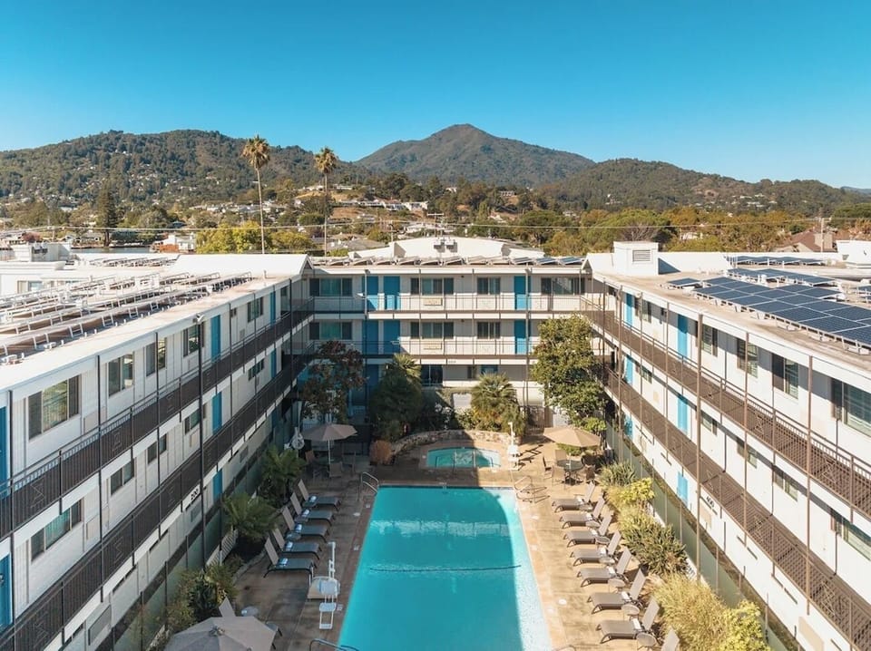 Soak up sunshine with a resort pool and mountain views.