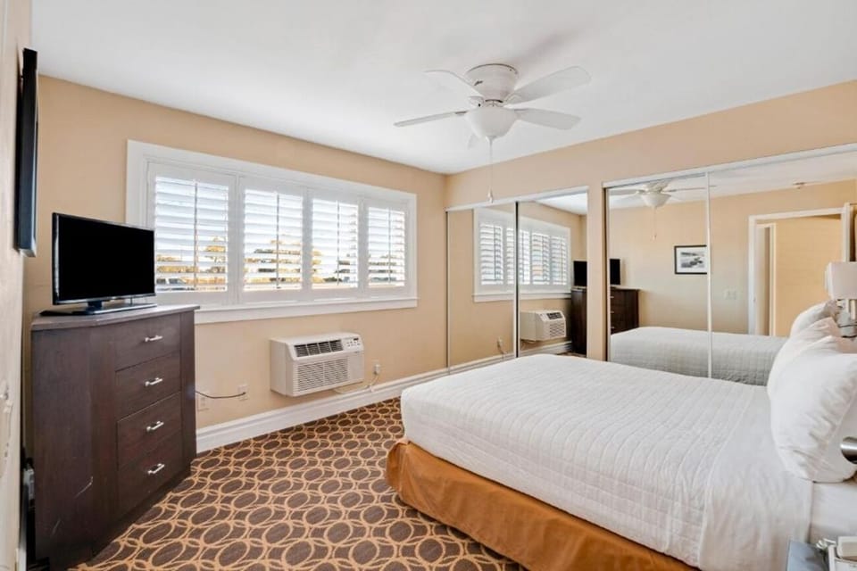 Wake up to daylight and enjoy easy in-room entertainment.