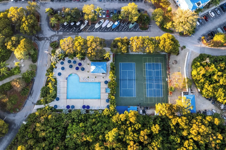 Dive into the sparkling pool, then rally on nearby courts.
