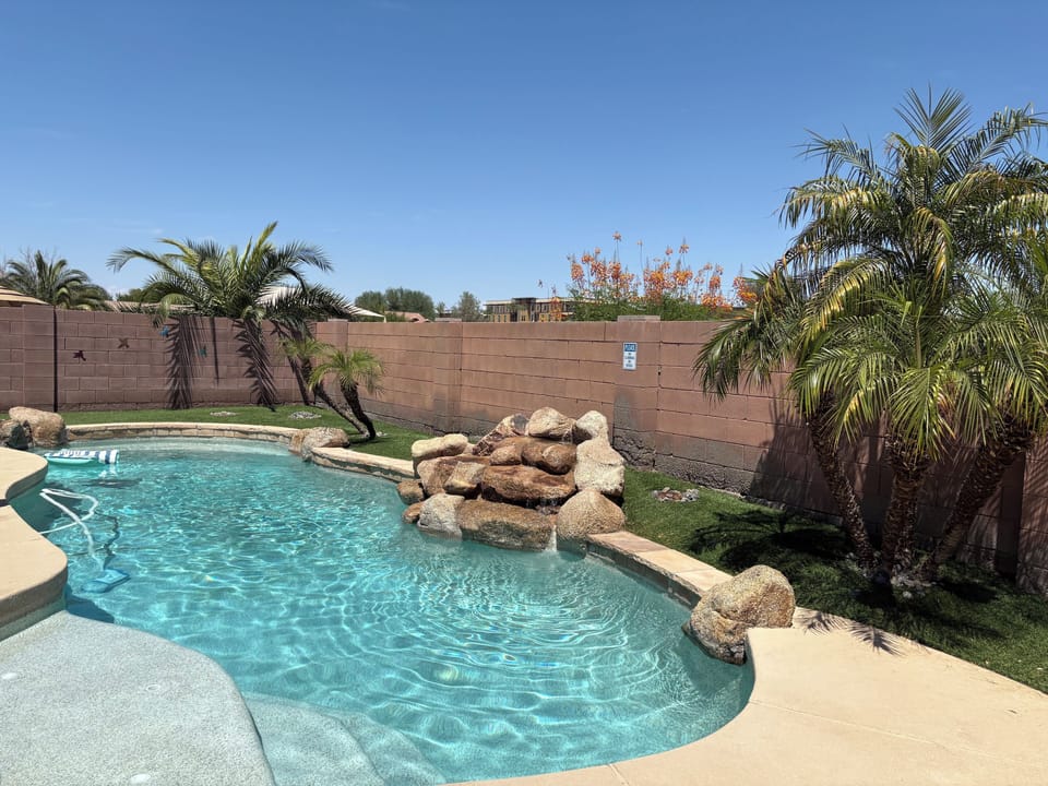 Make a splash or soak up the sun in this backyard oasis.