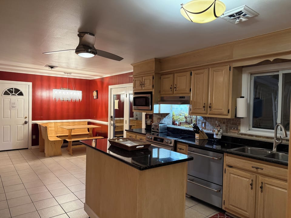 Eat in kitchen, (currently being painted, bye-bye, red walls) 1/29/26