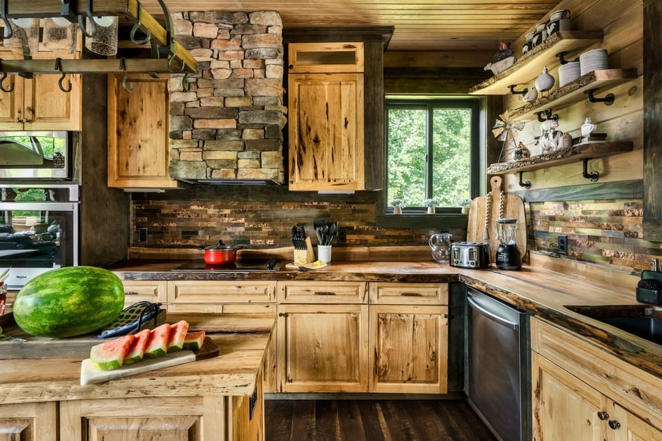 Warm wood cabinetry and modern appliances