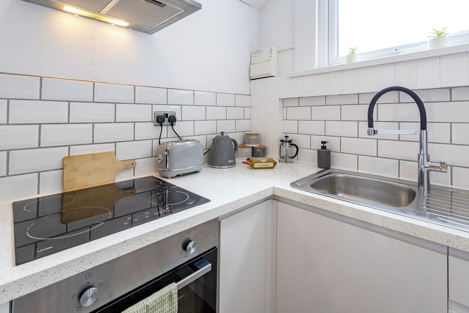 With charming details and thoughtful amenities, this kitchen feels just like home.