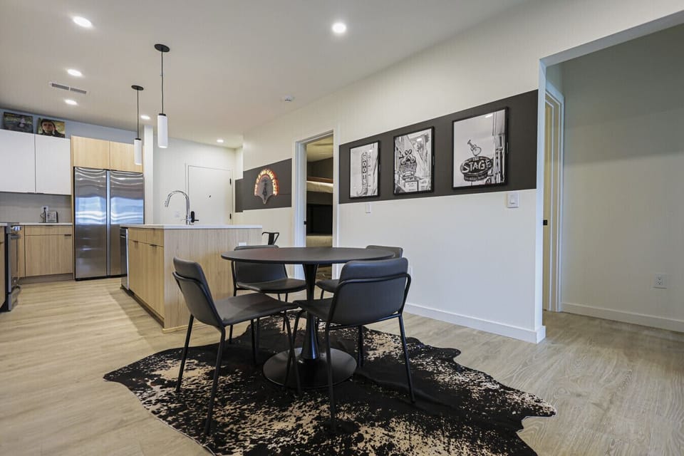 Gather around the table and enjoy meals in this bright, inviting dining area.