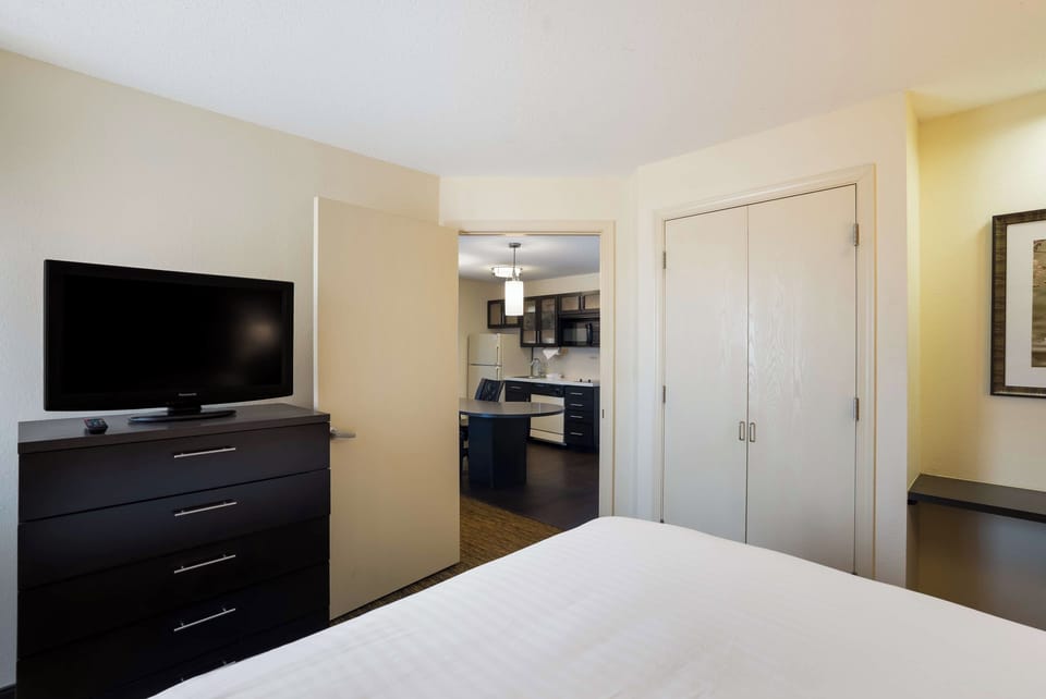 Settle in for a restful night with TV and ample storage.