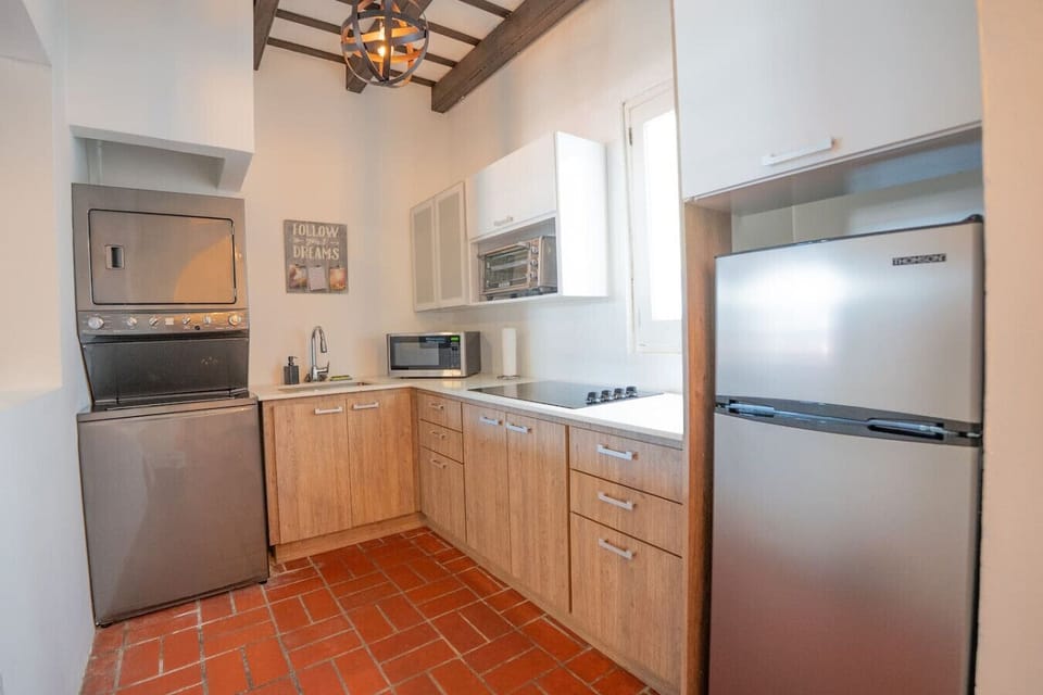 Fully equipped kitchen with stainless steel appliances