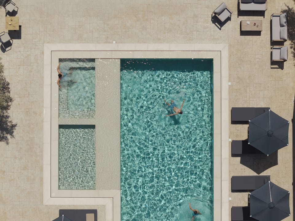 Bask in the Cretan sun beside your private 70m² heated saltwater pool.