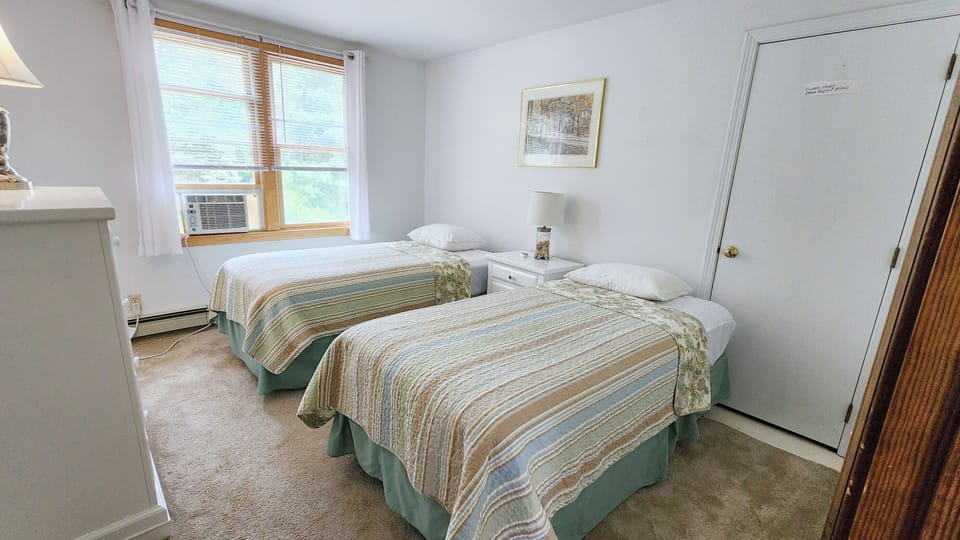 Second floor bedroom with two twins