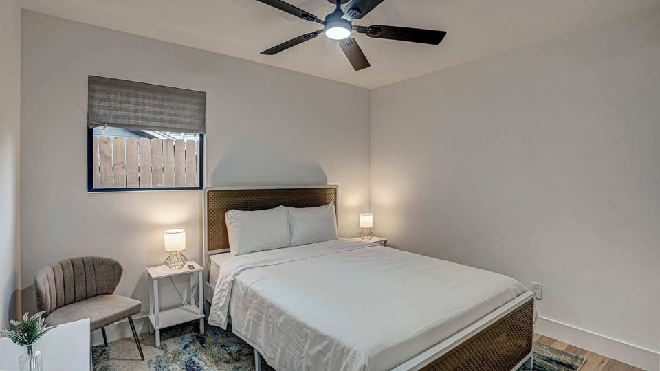 Relax on a plush queen bed