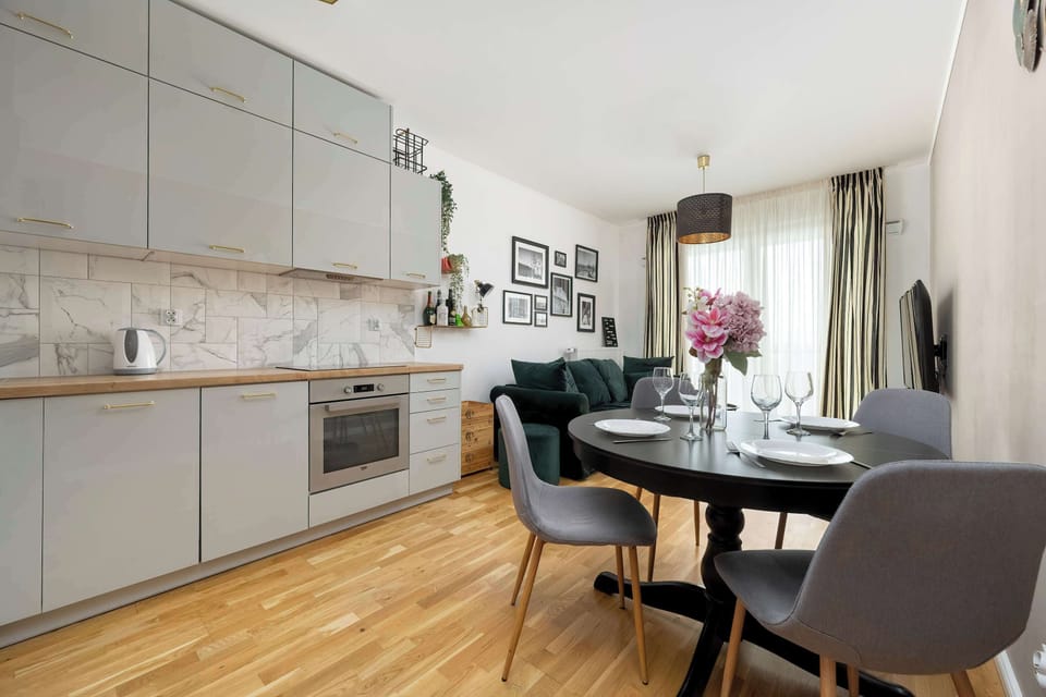 Cook and dine in style with the modern kitchenette and dining area.