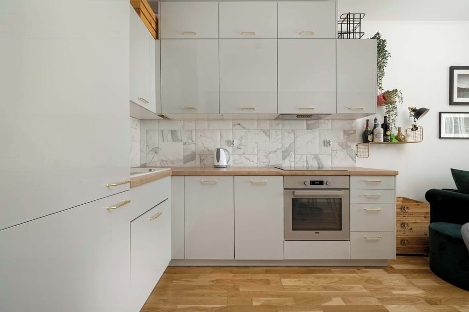 The kitchenette's practical layout maximizes space and functionality.