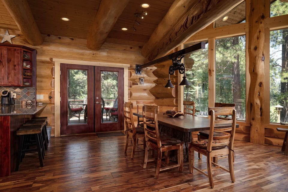 Dining area with table seating for 8 and deck access