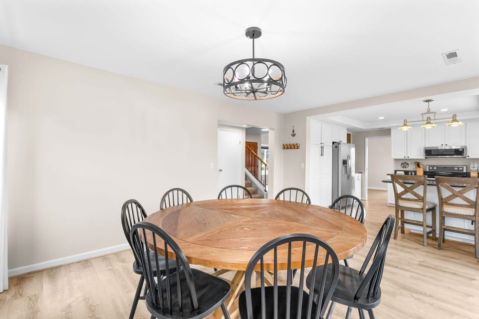 Dining room with large table, seating for 8