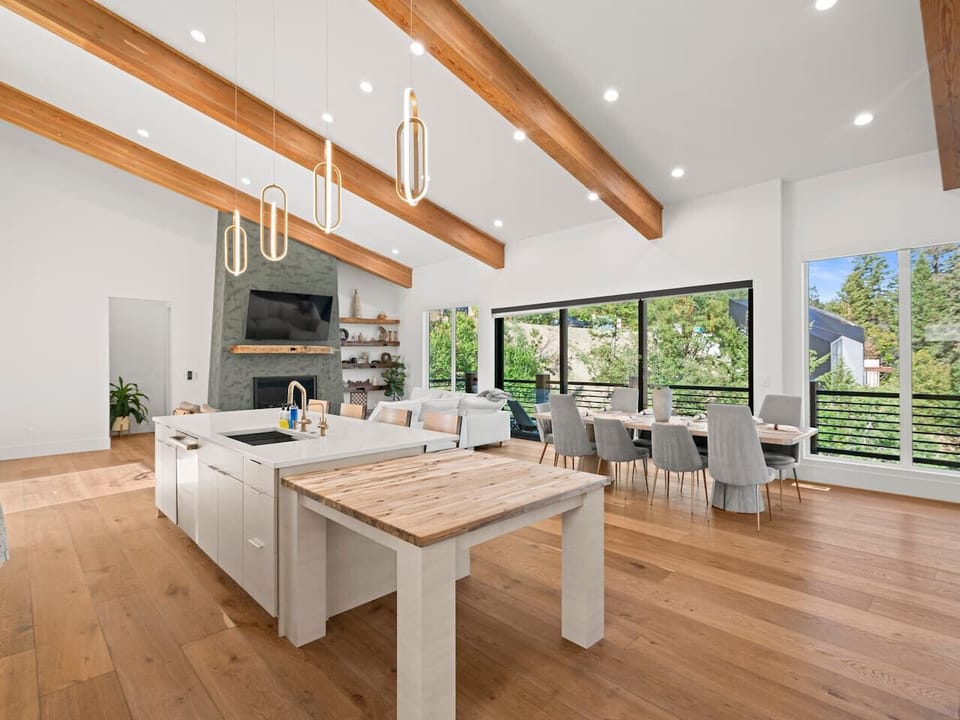 [Top Floor] Our incredible entertaining space complete with a dining table that seats 9, bar that seats 4, butcher block, living room, and full kitchen. Perfect for any gathering!*Foldable tables available for extra seating!