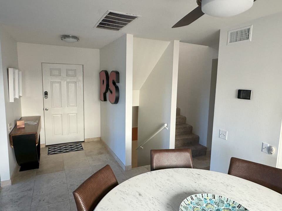 Front Entry, Down to carport, Upstairs, Dining Room