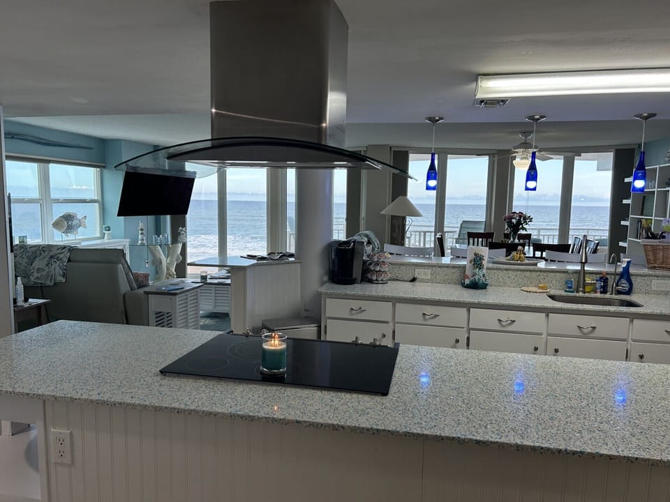 Kitchen with panoramic view of the ocean! 