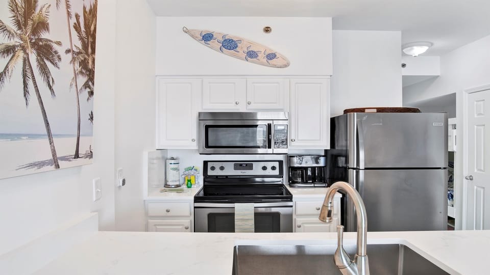 Kitchen with stainless appliances and Gulf view