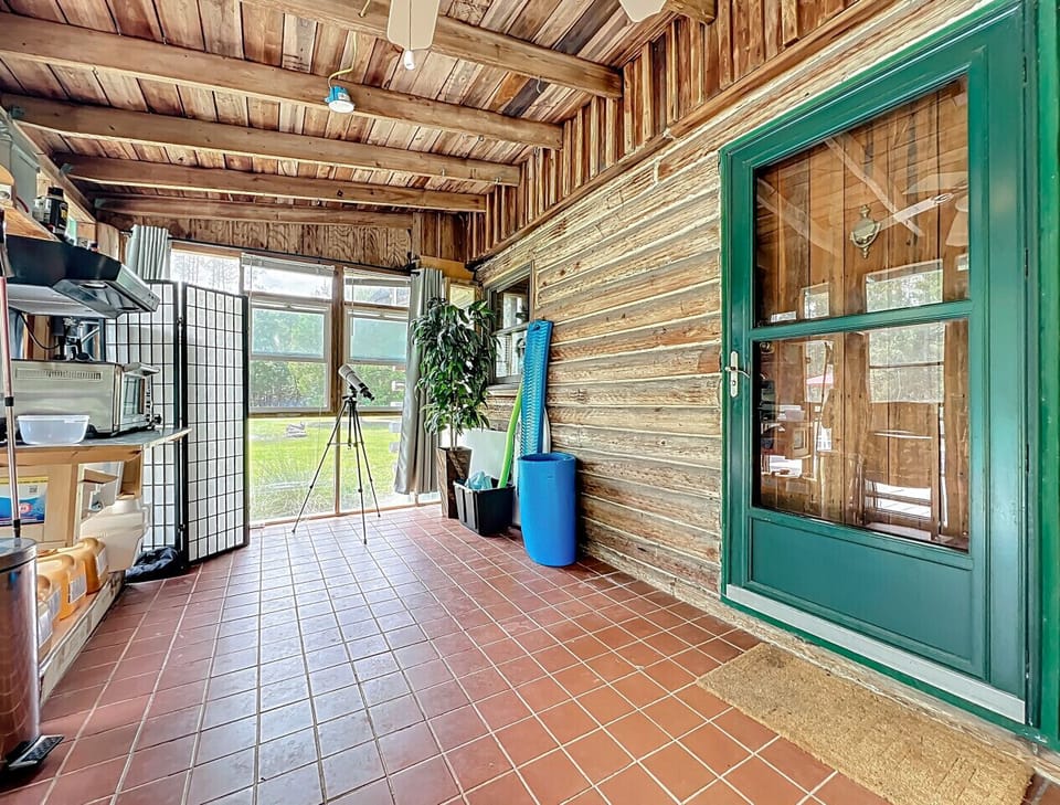 Sunroom Extension | Tile Floors & Wood Walls | Extra Storage & Supplies | Bright Yard Views