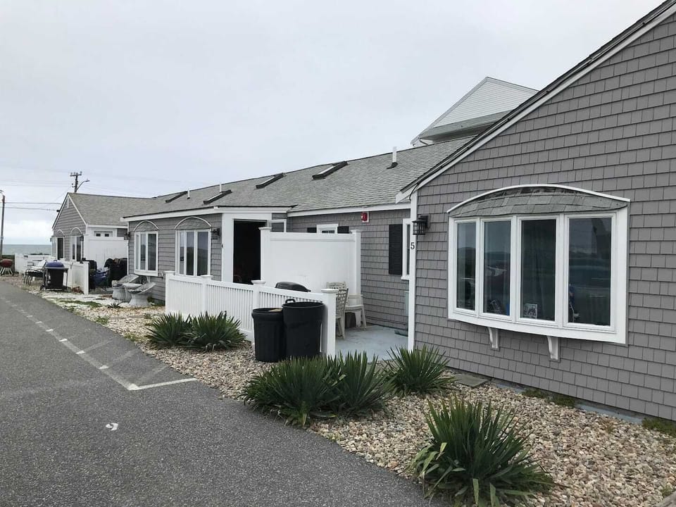 Steps to the Beach, the property was recently upgraded with new roof, siding and lighting.
