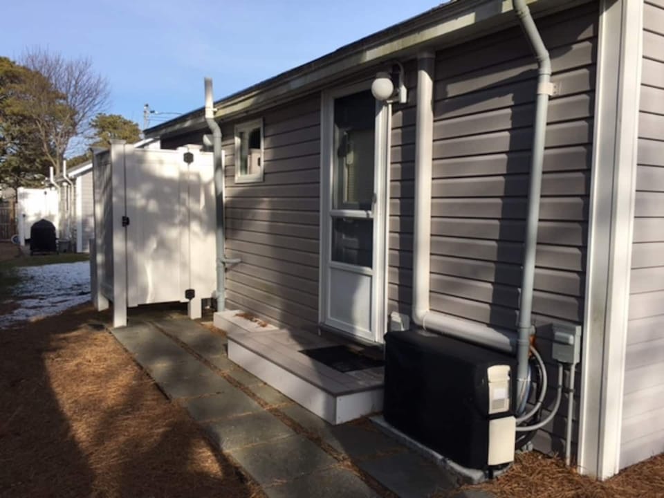 Rear - Outdoor shower and grill area