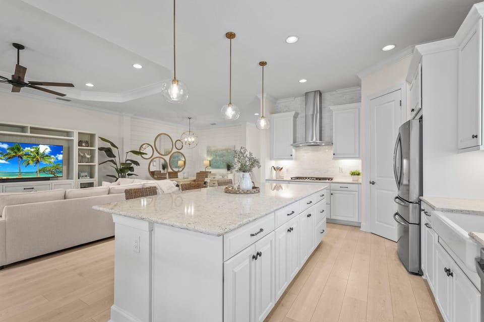open concept kitchen, living and dining area