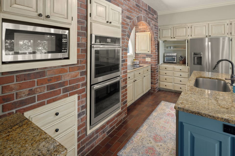 Double oven, microwave, griddle, air fryer, spices, olive oil, crockpot provided