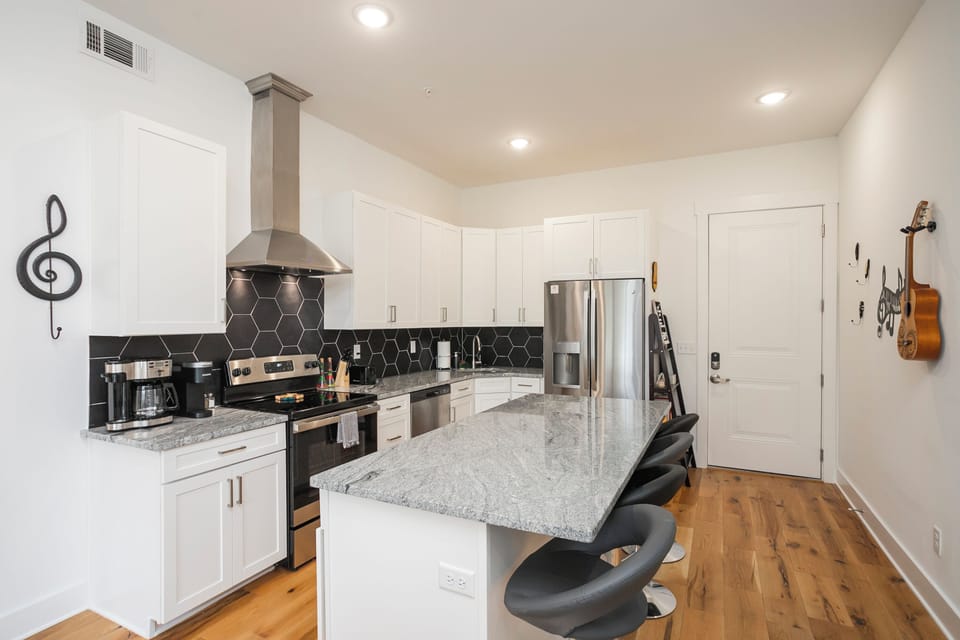 As you enter The Nashville Scene Suite, you'll walk right into the spacious kitchen. 