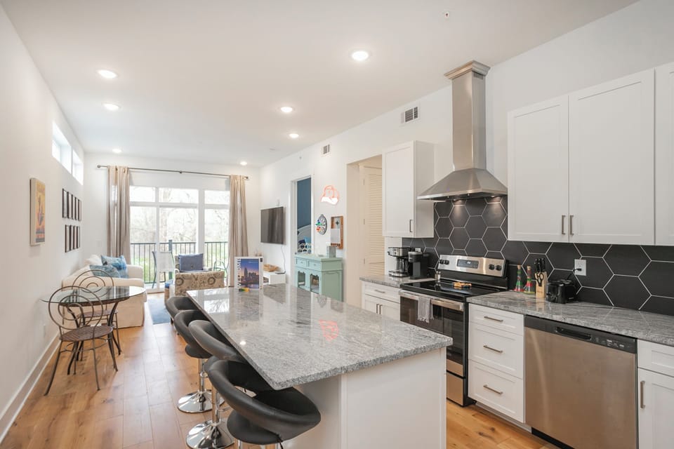 In the kitchen, you'll find upscale appliances and everything you need for your stay.