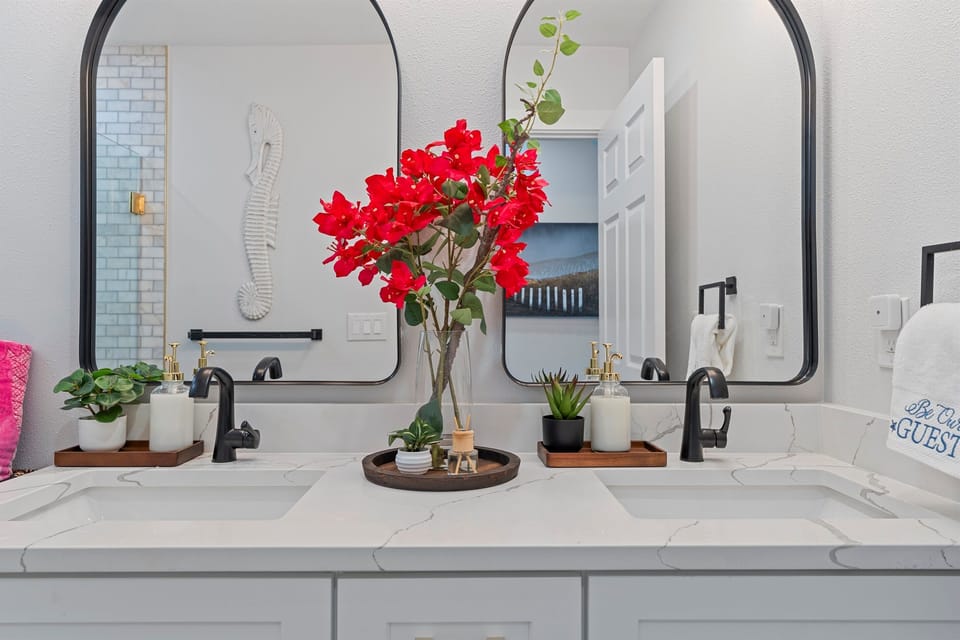 Modern bathroom vanity with elegant finishes and a spacious countertop.
