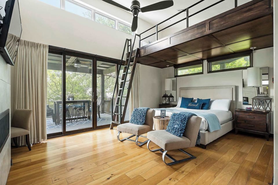 Welcome to our cozy cabin featuring a plush king bed and an inviting loft with a queen bed. Enjoy a private patio for morning coffee or evening relaxation, plus a convenient kitchenette for easy in-home meals.