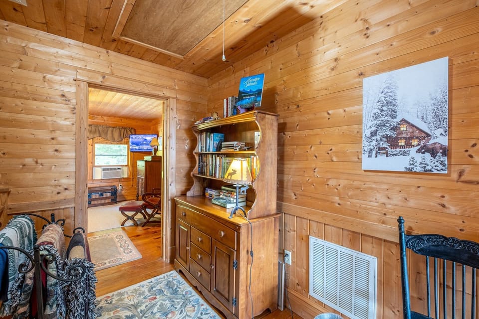 Located near Alarka, this rental cabin includes a central entry nook with shelving and seating - great for unpacking gear after day trips.