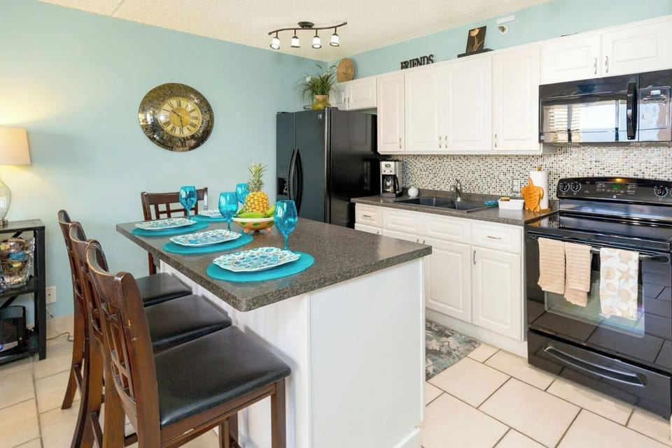 First unit dining area and kitchen