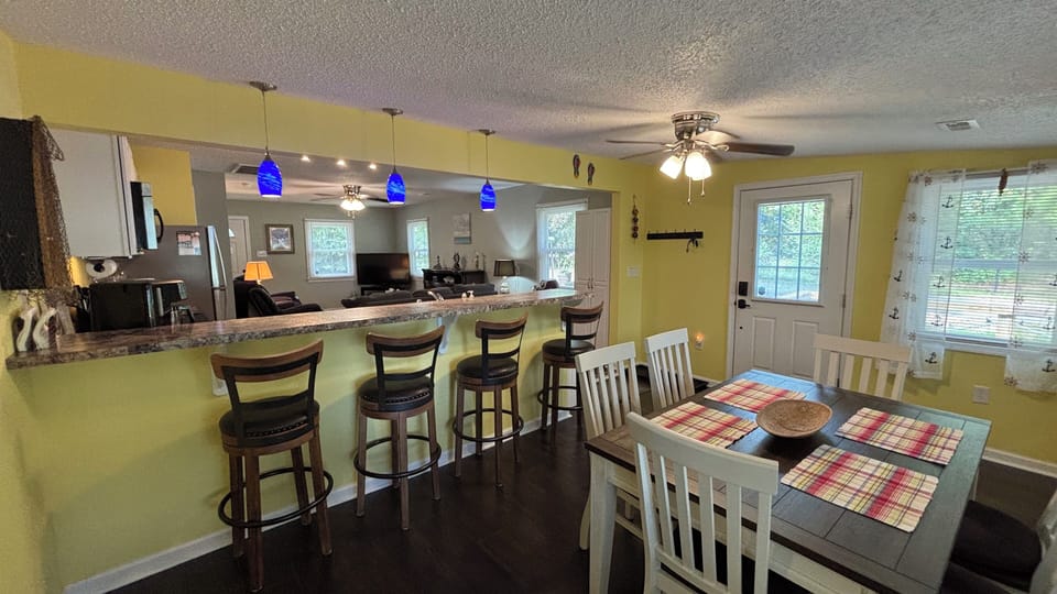 breakfast bar with 4 stools