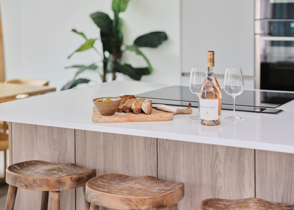 Kitchen island with bar stools