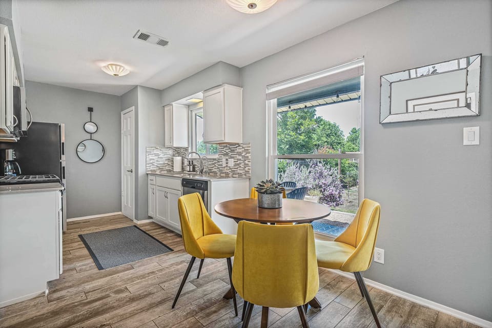 Dining area with sunny views, perfect for breakfast or work.