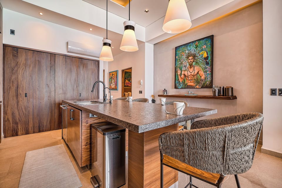 Fully equipped kitchen with breakfast bar and designer finishes.